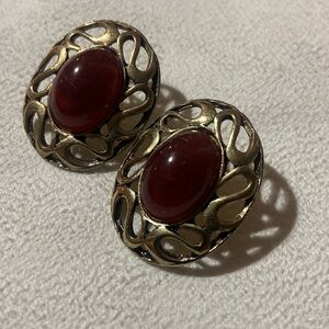 Earrings with red  stone